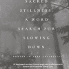 Front cover of a book: Background is greyscale, trees stretching upward. White text reads: 'Sacred Stillness: A word search for slowing down', 'Rooted in Care Collective', '20 word search puzzles, 4 journal pages and 20 affirmations to nurture self-acceptance & inner calm'
